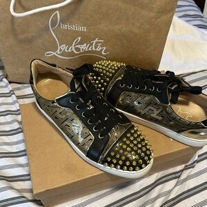 Black & Gold red bottoms really good condition